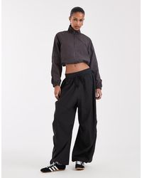 BRONZE SNAKE - Cargo Balloon Trousers - Lyst