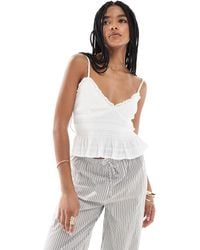 Stradivarius - Top volanté à col v - Lyst