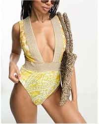 River Island - Plunge Wrapover Trim Printed Swimsuit - Lyst