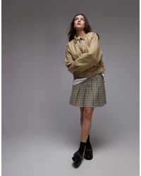 TOPSHOP - Mini-jupe plissée coupe carrée - vert à carreaux - Lyst