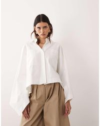 ARRANGE - Oversized Cape Square Cut Cotton Shirt - Lyst