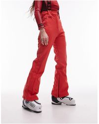 TOPSHOP - Sno - pantaloni da sci a zampa rossi con bretelle - Lyst