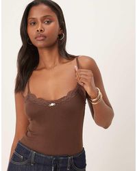 For Love & Lemons - Elliana Pointelle Lace Trim Bodysuit - Lyst