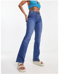 Jdy - Flora - jeans a zampa lavaggio medio a vita alta - Lyst