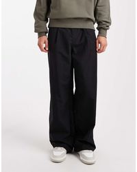 ASOS - Pantalon ultra-baggy en nylon avec plis - Lyst