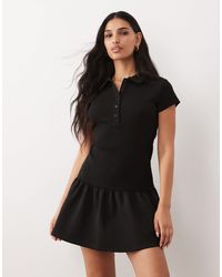 ASOS - Robe polo courte 2-en-1 en maille interlock côtelée avec ourlet à basque - Lyst