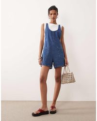 ASOS - Denim Playsuit With Scoop Neck And Cross Back - Lyst