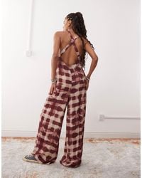 Reclaimed (vintage) - – camisole-jumpsuit mit rückenausschnitt und floralem karomuster - Lyst