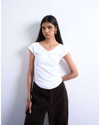TOPSHOP - Rib Fitted V-neck Curve Hem Tee - Lyst