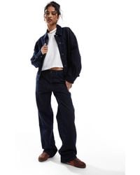 Object - – jeans aus dunkelem denim mit weitem bein mit umschlag und streifendetail, kombiteil - Lyst