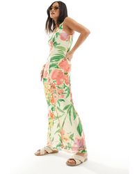 Vero Moda - Vestido veraniego sin mangas con borde ondulado y estampado floral - Lyst