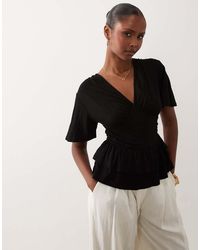 ASOS - V Neck Top With Ruffle Peplum Hem - Lyst