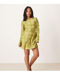 Never Fully Dressed - Vestido Corto Caqui De Manga Larga Con Estampado De Ojos De Petite-Verde - Lyst