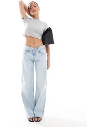 Levi's - Jean ample à taille ultra basse - délavé - Lyst