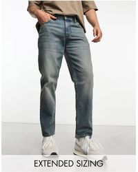 ASOS - – klassische jeans aus festem stoff mit heller vintage-tönung - Lyst