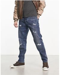 Armani Exchange - Tapered Leg Jeans - Lyst