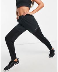nike black essentials slim trackies