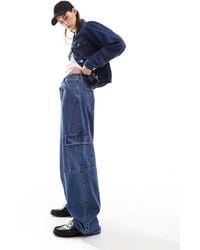 Dr. Denim - Hill - jeans cargo a vita bassa comodi con gamba dritta a fondo ampio e tasche lavaggio stone medio - Lyst