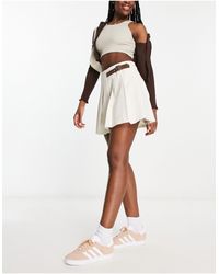 Urban Revivo - Pleat Mini Skirt With Buckle Detail - Lyst