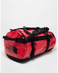 The North Face - Petate rojo y negro base camp m - Lyst