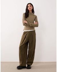 Free People - Breezy - pull en maille côtelée à col montant et manches longues - dune fossile kaki - Lyst