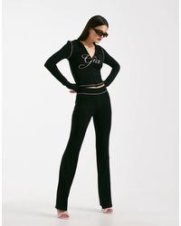 I.AM.GIA - Blare Logo Back Print Contrast Stitch Track Pants - Lyst