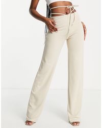 Mujer Ropa de Pantalones pantalones de vestir y chinos de Pantalones tobilleros Vaqueros color polvareda de NA-KD de color Neutro 