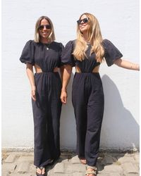 Labelrail - X Collyer Twins Broderie Puff Sleeve Cut-out Detail Jumpsuit - Lyst
