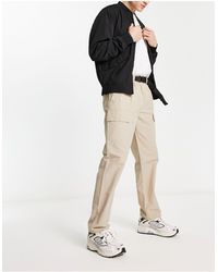 New Look - Pantaloni cargo multitasche color pietra con cintura con chiusura a clip - Lyst