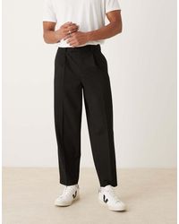 ASOS - Pantalones De Vestir Negros De Corte Tapered Extragrande Con Pinzas De Tejido Microtexturizado De - Lyst
