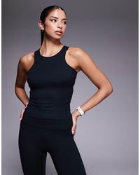 4505 - Plush Lightweight Ribbed Racer Vest With Inner Bra And Removeable Padding - Lyst