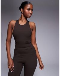4505 - Icon Soft Touch Racer Back Vest With Inner Bra And Removable Padding - Lyst