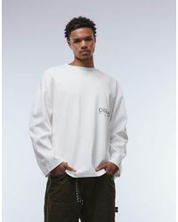 ASOS - Premium T-Shirt Van Superzware Stof Met Lange Mouwen, Verlaagde Schouders En Grafische Tekstprint - Lyst