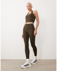 4505 - Hourglass Icon Active Bum Sculpt High Waist Gym legging With Inner Pocket - Lyst