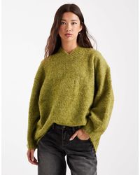 ASOS - Pull long en maille bouclée avec col v - olive foncé - Lyst