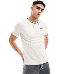 Barbour - Camiseta color marfil con logo pequeño y ribetes buxton - Lyst
