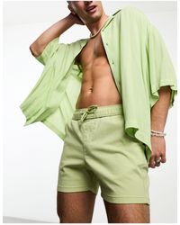 ASOS - Pantalones cortos verdes entallados - Lyst