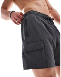 Hollister - Pantaloncini da bagno da 9" neri con tasche laterali - Lyst