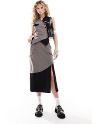 Reclaimed (vintage) - Falda midi y negra con diseño dividido - Lyst