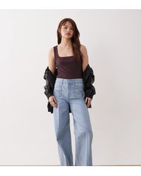 ASOS - Asos Design Petite High Waist Wide Leg Jeans With Front Pockets - Lyst