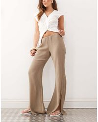 Weekday - Flare Leg Plisse Trousers With Split Hem Detail - Lyst