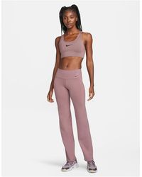 Nike - Dri-fit power - pantaloni a zampa color malva fumo - Lyst