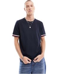 Tommy Hilfiger - Camiseta azul marino con ribetes y logo estilo monotipo bold - Lyst