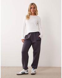 Kaiia - Petite Cotton Blend Embroidered Logo Cuffed joggers - Lyst