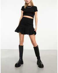 & Other Stories - Minifalda negra con estampado - Lyst