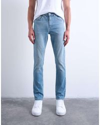 TOPMAN - Vaqueros Elásticos De Corte Pitillo Con Lavado Claro De -Azul - Lyst