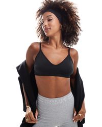 4505 - Intimate Seamless Active Light Support Sports Bra - Lyst