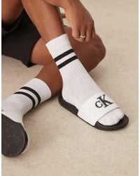 Calvin Klein - Sandalias Blancas Y Negras Con Logo De -Negro - Lyst