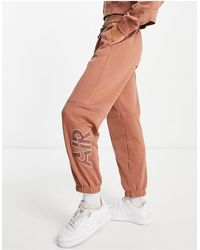 nike grey essentials slim joggers
