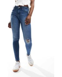 ONLY - Jeans Skinny Push Up Medio - Lyst